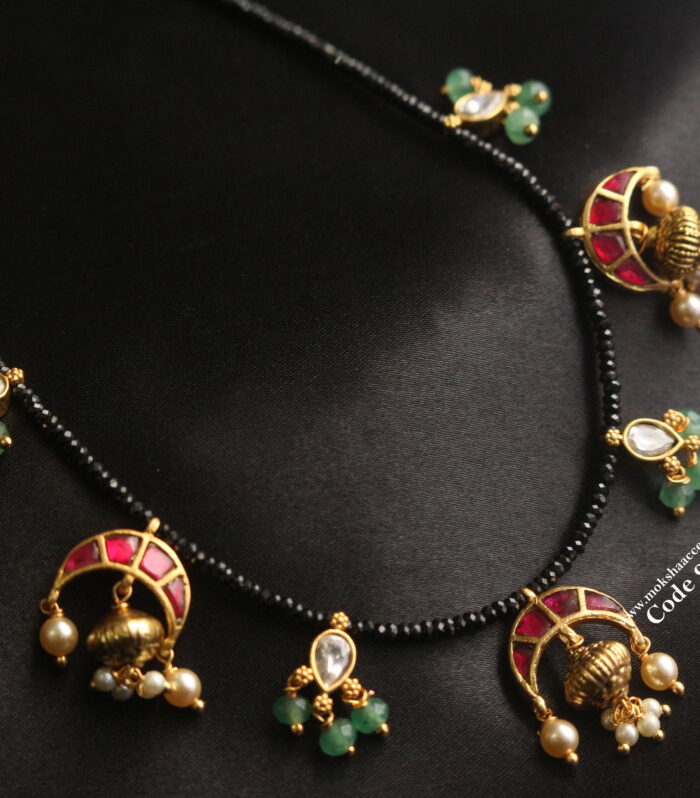 Jadaukundan pendants with black beads and nakshi balls