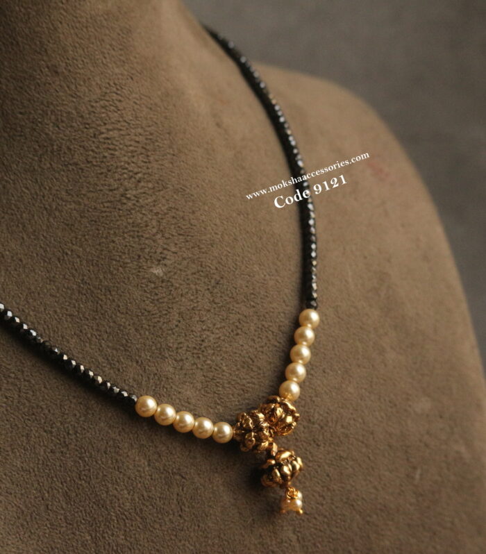 Real cz black beads with nakshi balls and sarvoski pearls