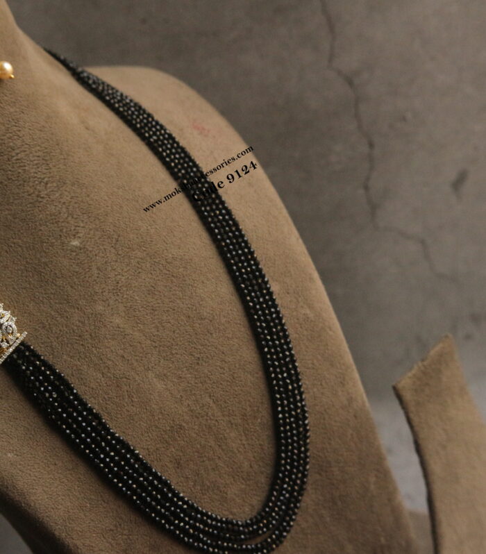 CZ side pendant with black beads and earrings