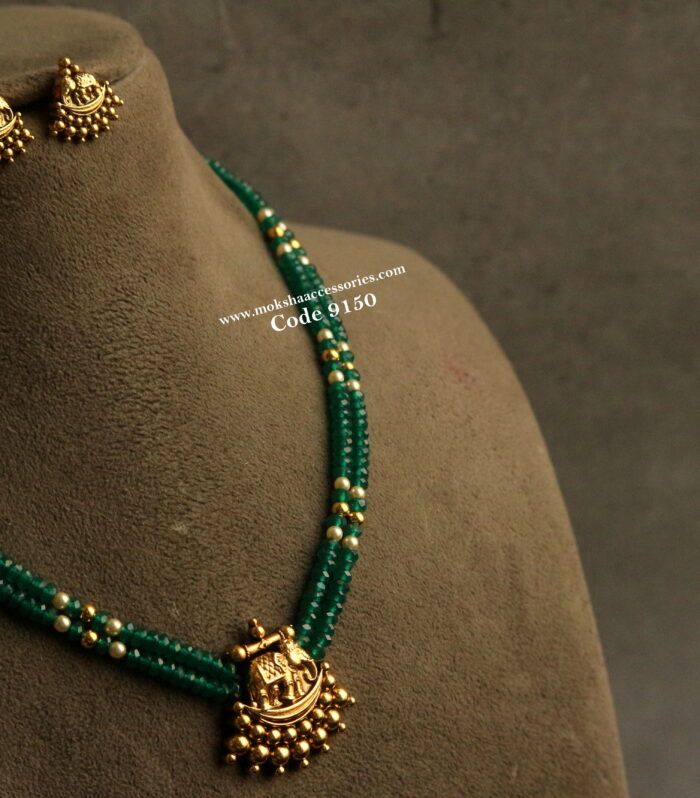 Nakshi gold pendant set with green beads and sarovski pearls