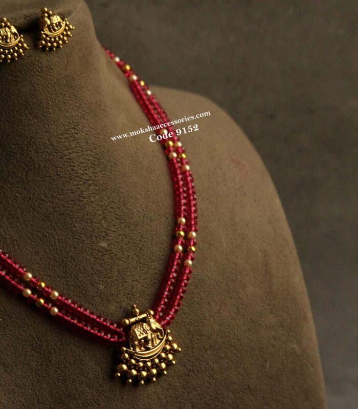 Nakshi gold pendant set with pink beads and sarovski pearls