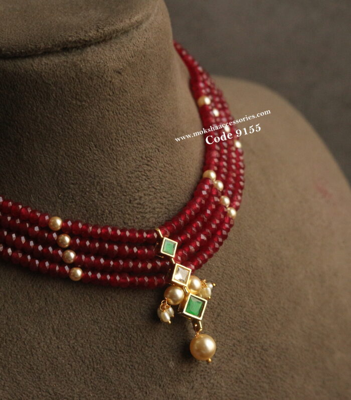 Kundan pendant with ruby marroon and sarvoski pearl