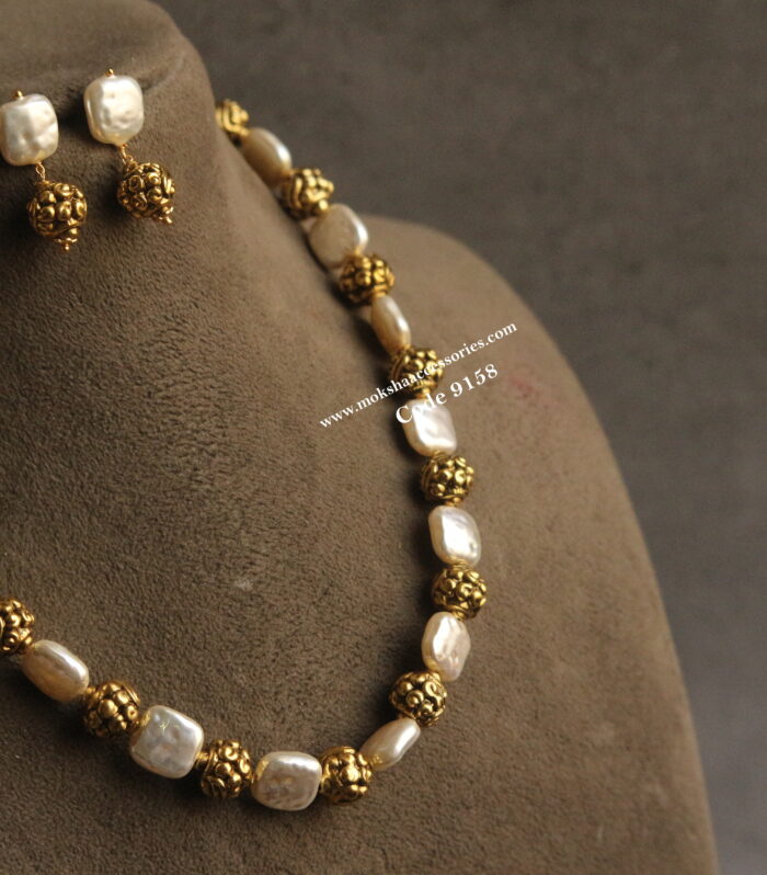 Freash water pearls and nakshi gold balls