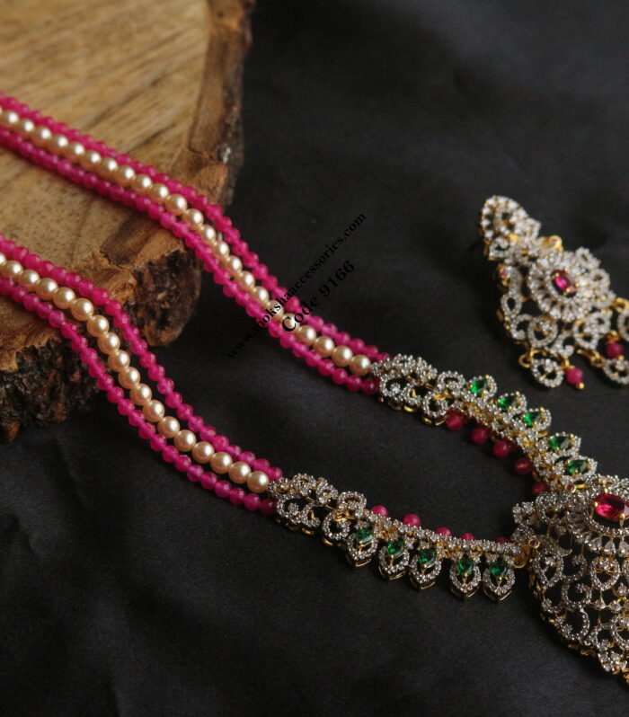 Diamond alike pendant set with pink beads and sarvoski pearls