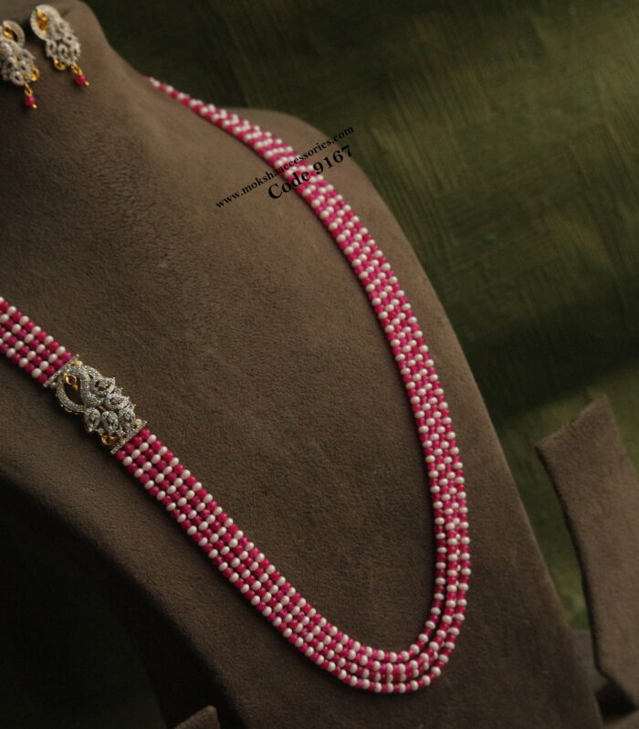 Diamond alike cz pendant set with pink beads and pearls