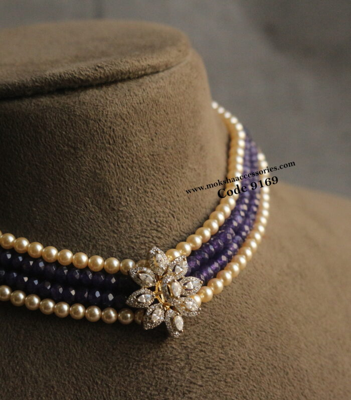 CZ pendant with sarvoski pearls and purple beads
