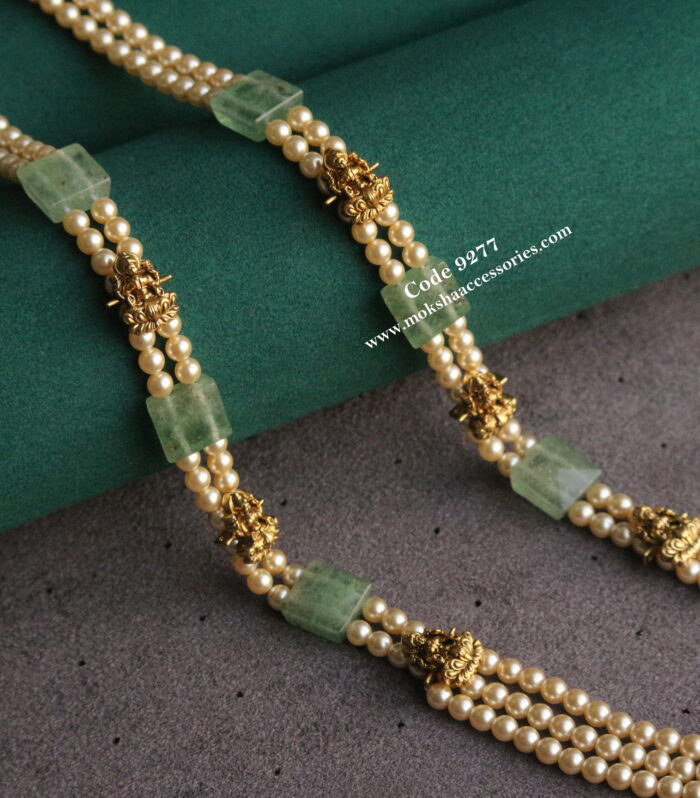 Emerald and sarvoski pearls mala with nakshi lakshmi devi pendants