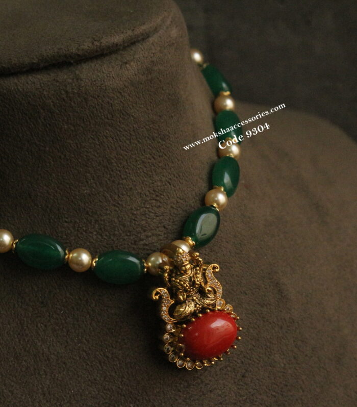 Lakshmi devi coral pendant with emerald and coral choker