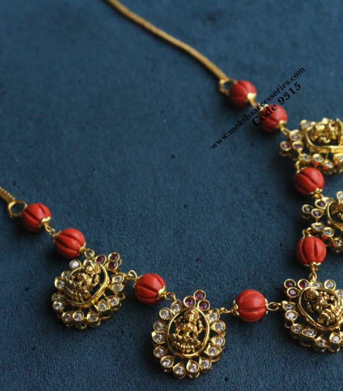CZ lakshmi devi pendants with coral pumpkins and gold chain