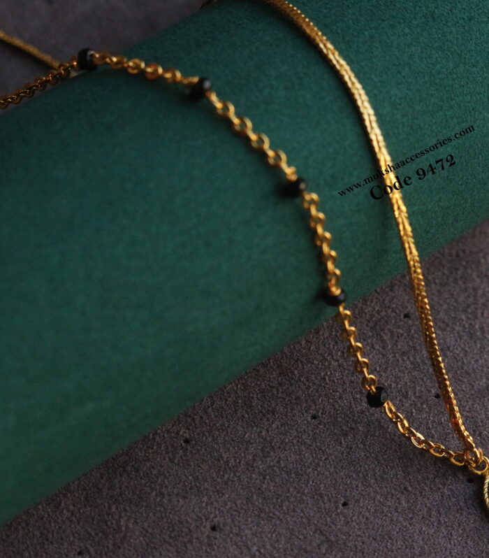 Lakshmi kasu pendant with gold chain and black beads