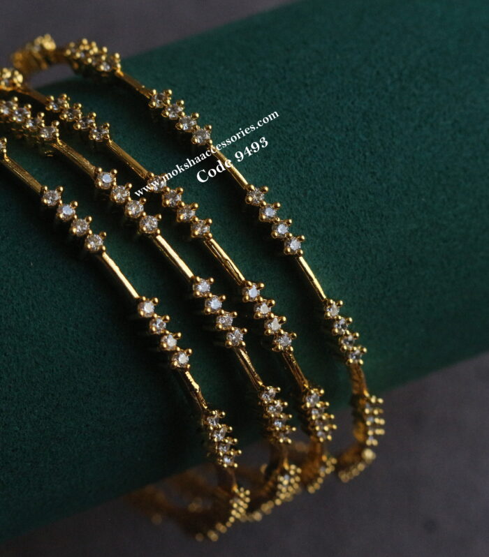 CZ gold bangles set of 4 (Available sizes - 2.8-1)