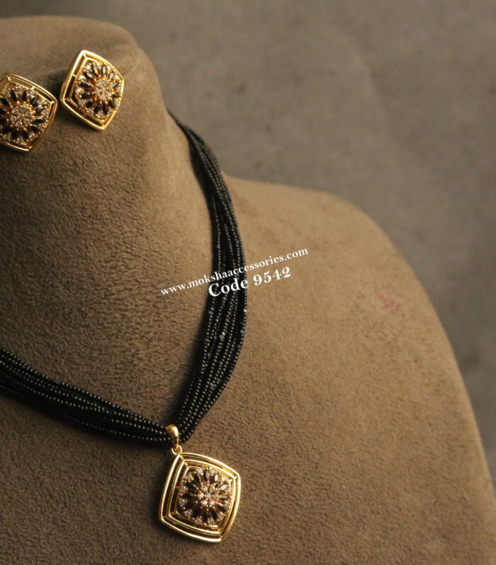 CZ black stone pendant set with black beads