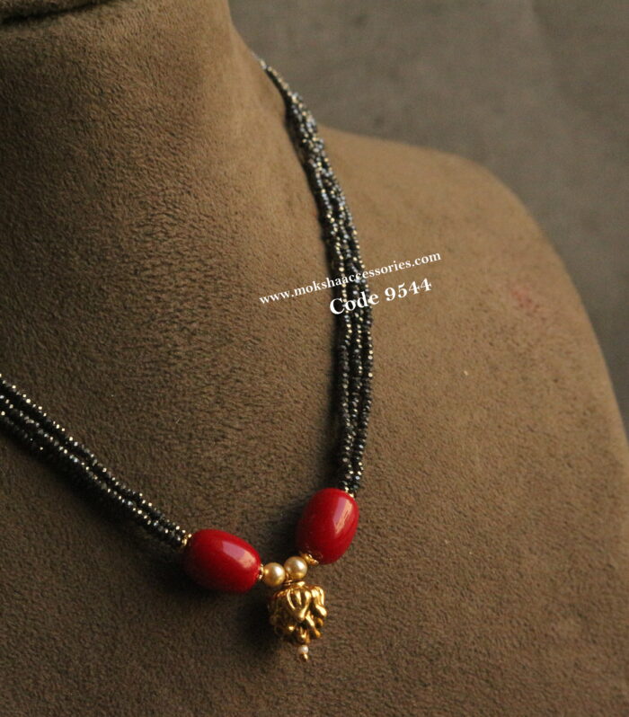 Real black diamonds with nakshi ball and corals