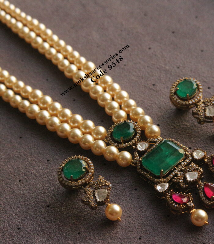 Mozonite stone pendant set with sarvoski pearls haram