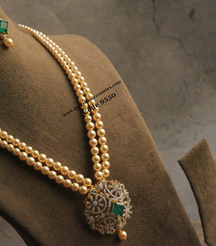 Diamond alike cz pendant set with sarvoski pearls haram