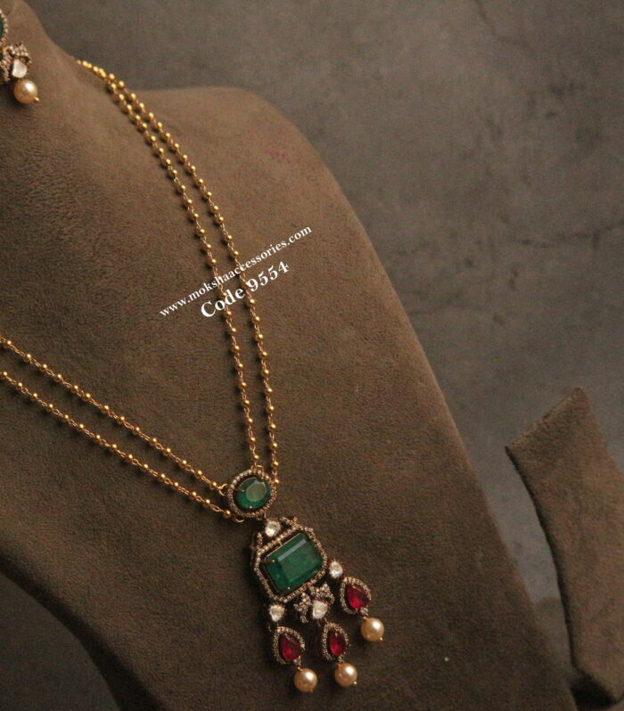Emerald, ruby and mozonite stone pendant set with gold balls 2 layer chain