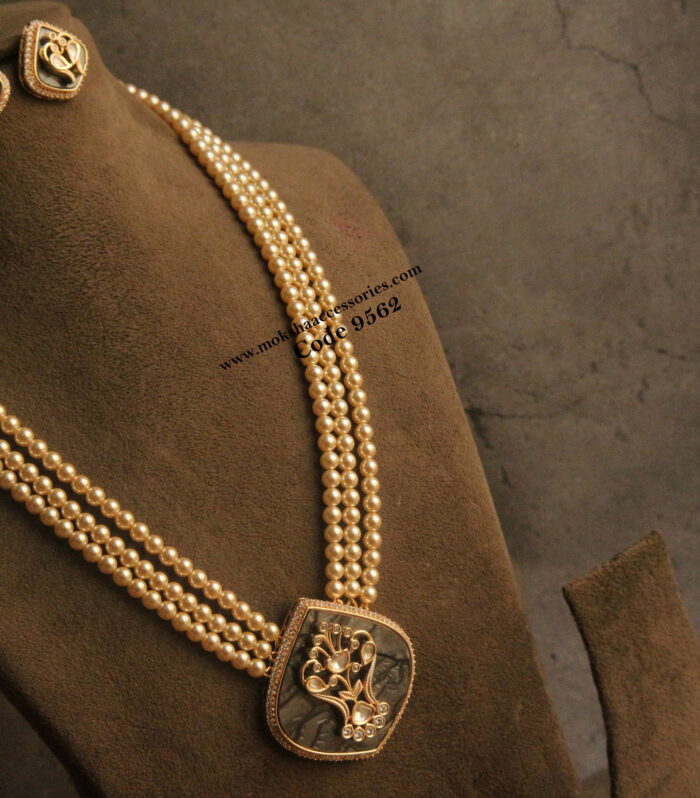 Glass stone kundan pendant set with sarvoski pearl haram and earrings