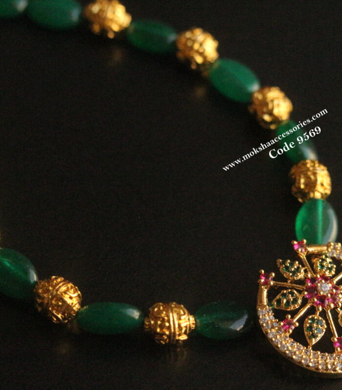 CZ multi stone pendant with emerald beads and gold balls