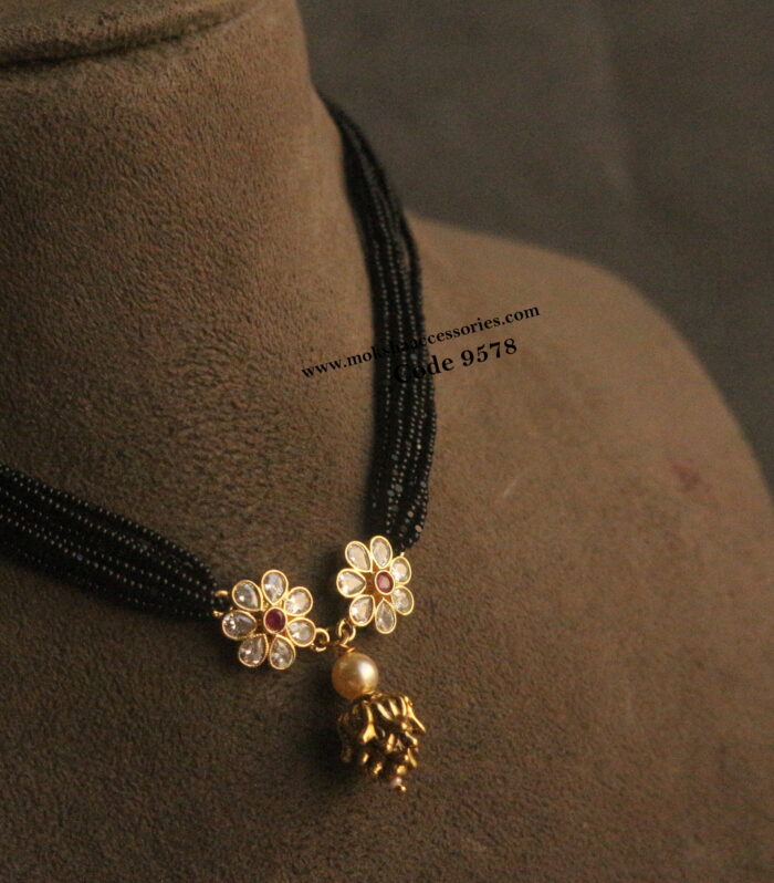 CZ pendant with nakshi ball and black beads