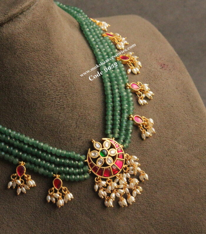 Jadaukundan pendants with emerald beads and rice pearl drops