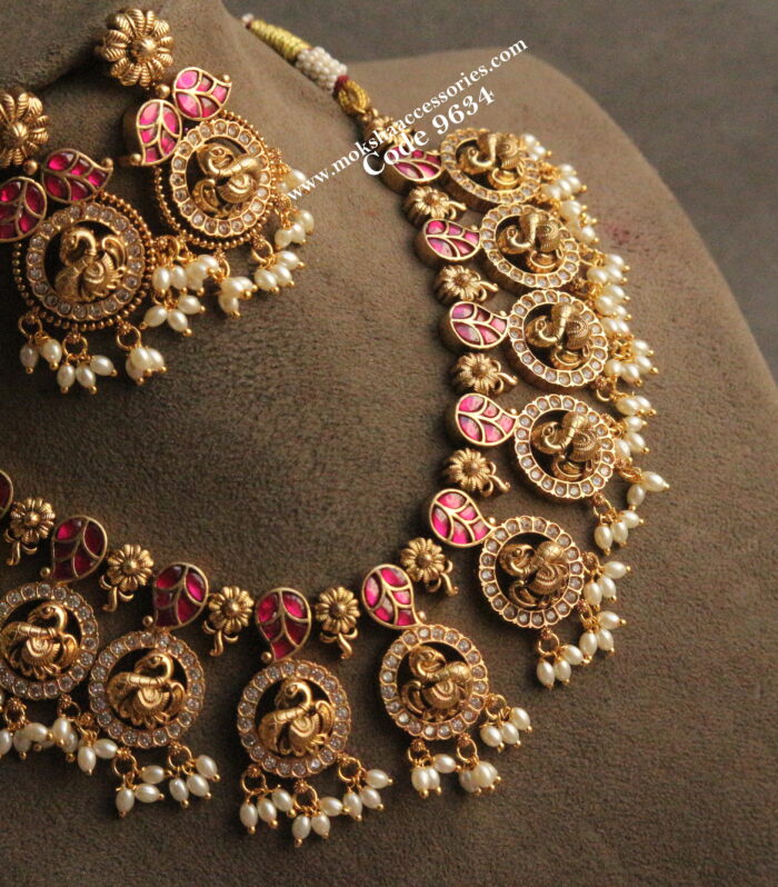 Jadaukundan necklace set with rice pearl drops