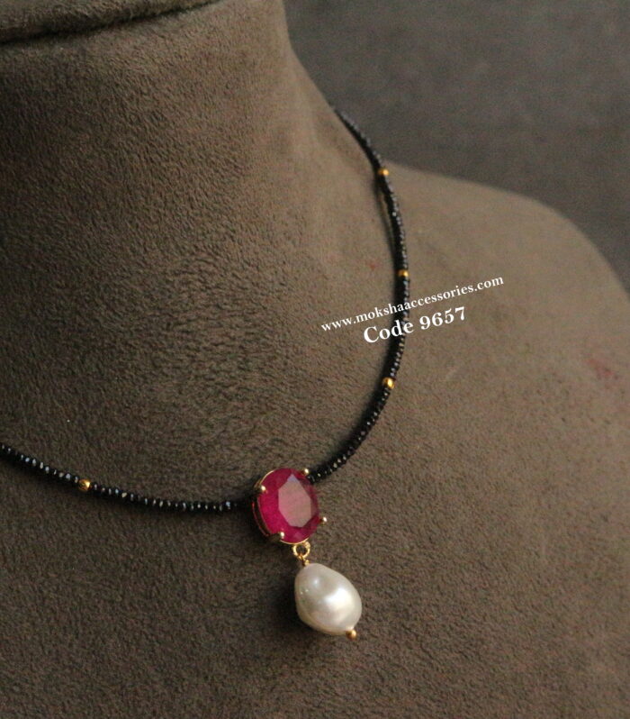 Real cz black beads with ruby pendant and fresh pearl drop