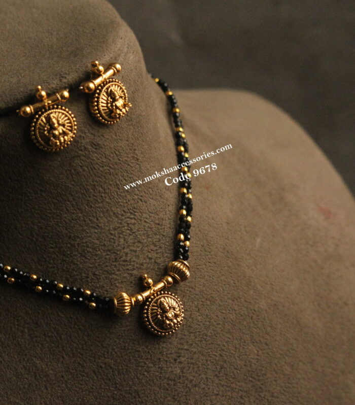 Nakshi pendant set with black beads and gold balls choker set