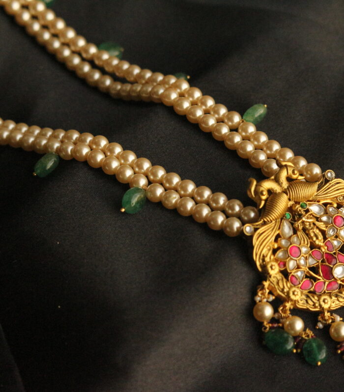 Jadaukundan krishna pendant with sarvoski pearls and russian emerald beads
