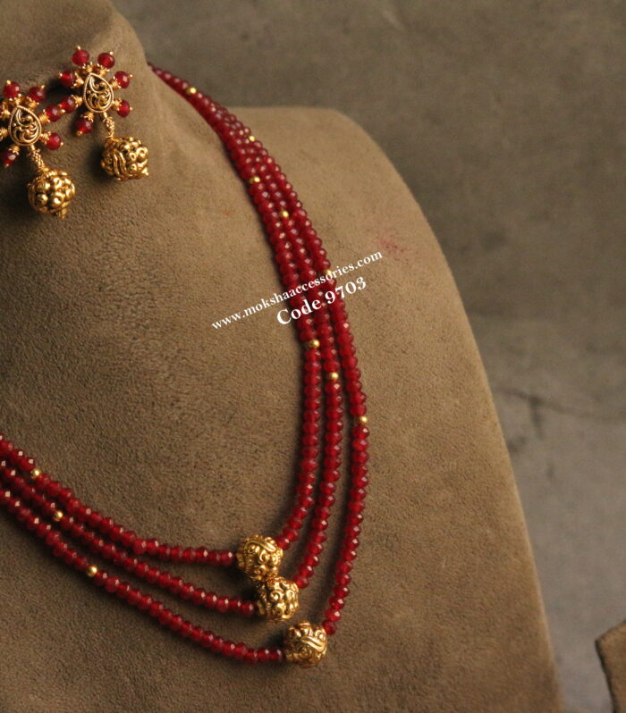 Ruby marroon onyx beads with nakshi gold balls and earrings
