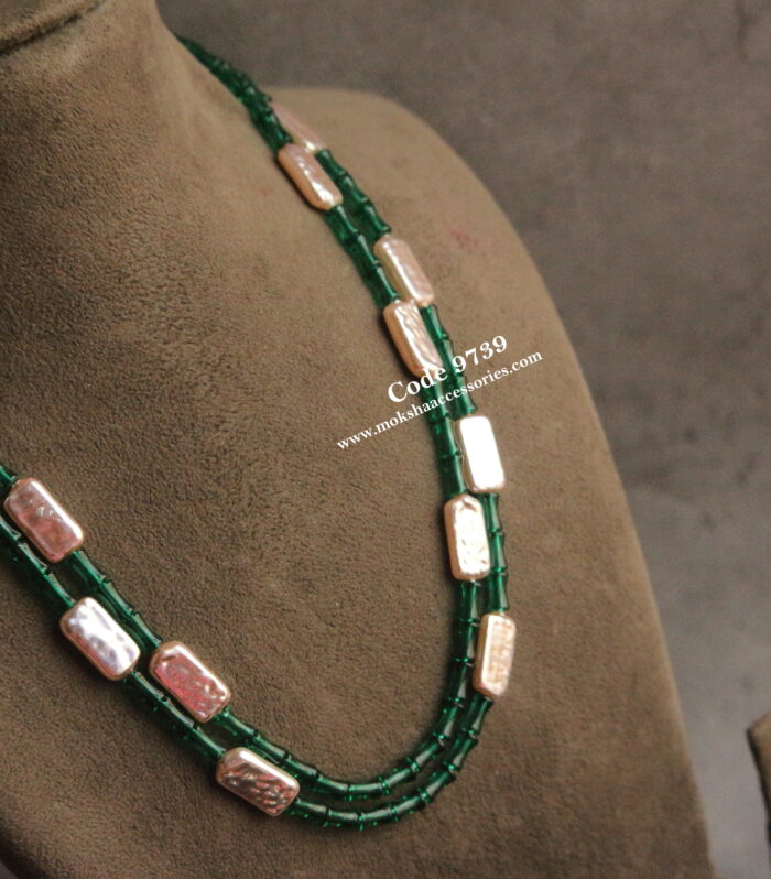 Fresh water pearls with fancy green beads