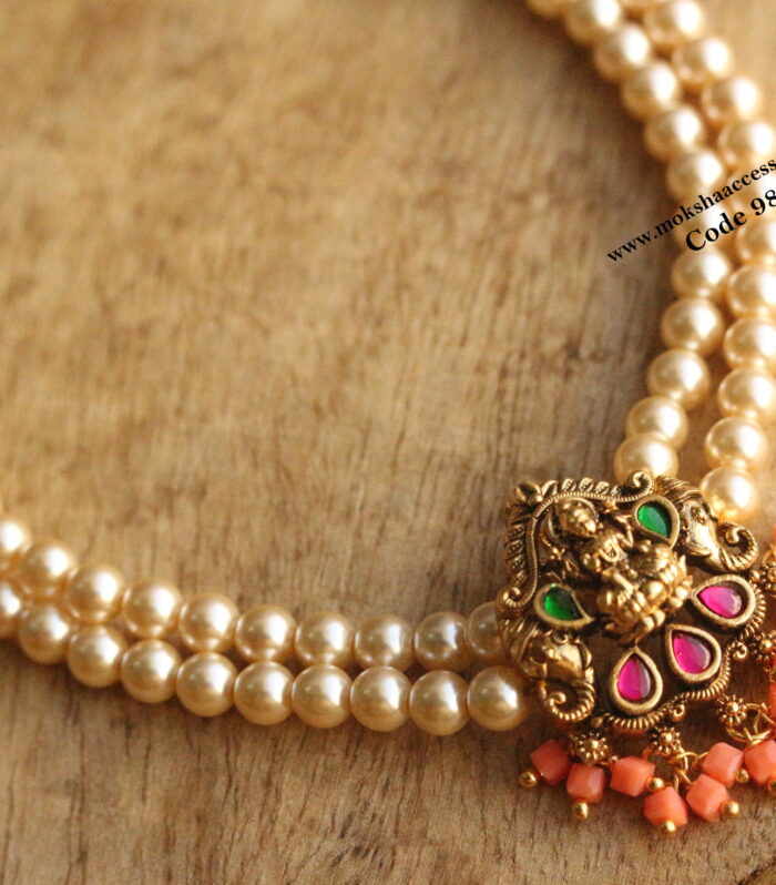 Nakshi jadaukundan choker with corals and sarvoski pearls