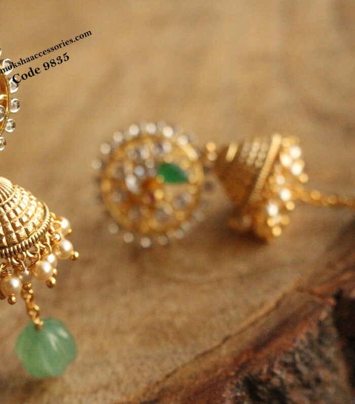 GJ stone jhumki with sarvoski pearl and natural pumpkin drops