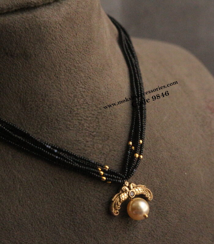 Nakshi pendant with black beads and gold balls
