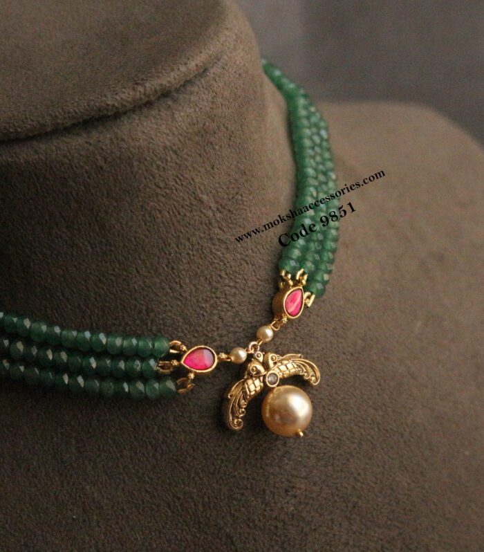 Nakshi pendant with emerald beads and jadaukundan pendants