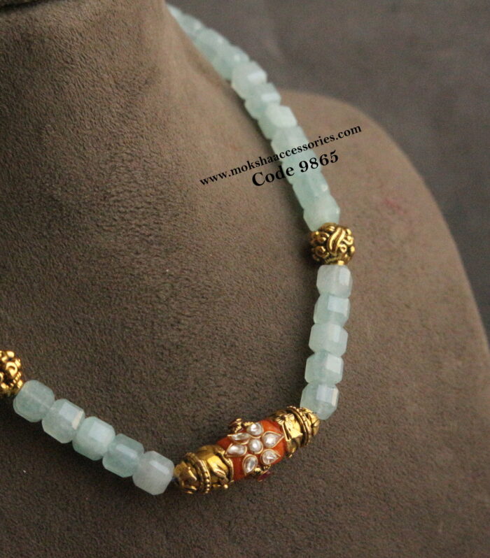 Real coral pendant with natural thurmalin beads and nakshi gold balls