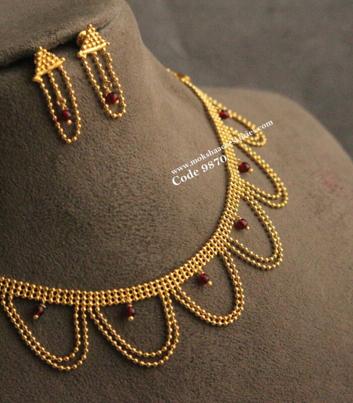 Gold drop chains with ruby drops