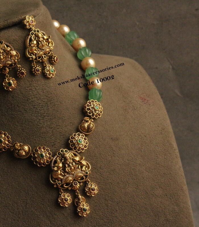 nakshi neckset with pumpkin beads and sarvoski pearls