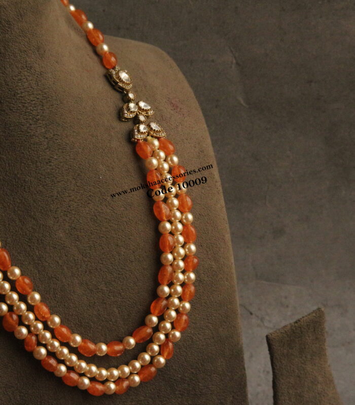 Mozonite stone pendants with onyx orange beads and sarvoski pearls
