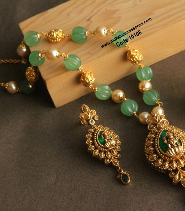 Nakshi pendant set with pumpkin beads and gold balls haram