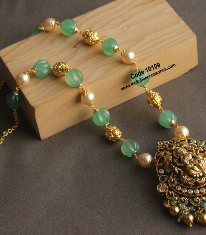 Nakshi lakshmi devi pendant with pumpkin beads and gold balls mala