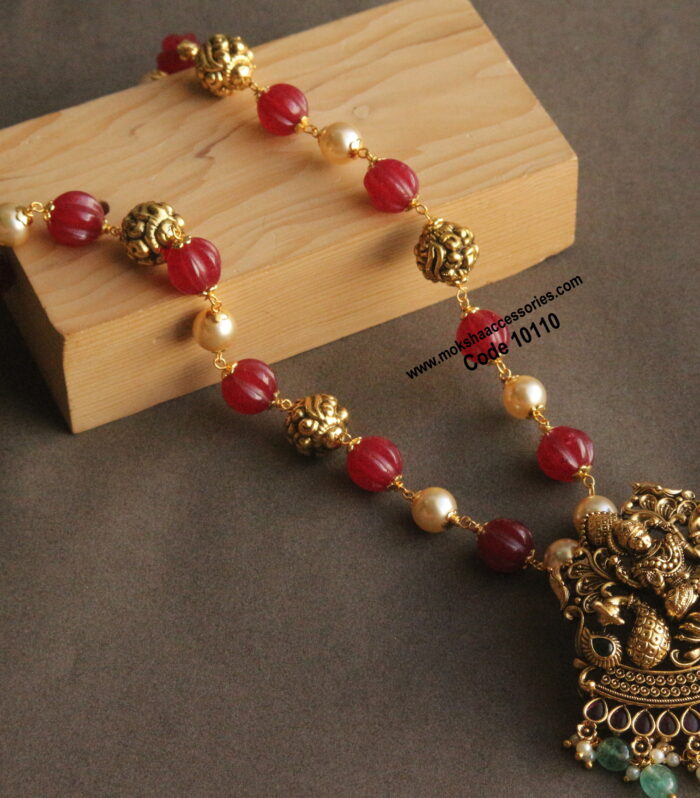 Nakshi lakshmi devi pendant with pumpkin beads and gold balls mala
