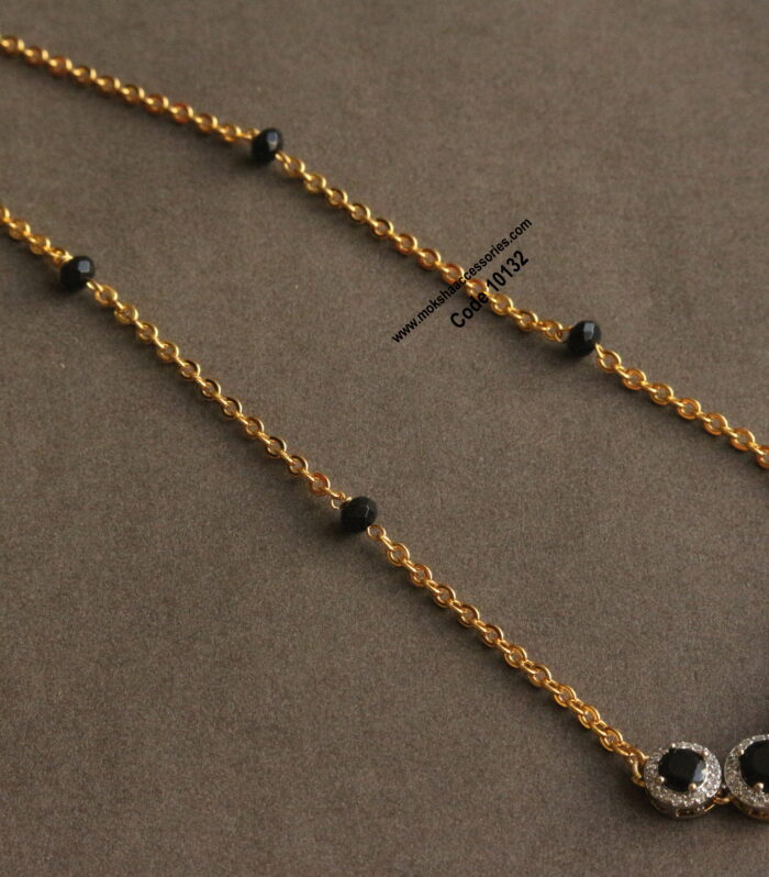 CZ black stone pendant with gold chain and black beads