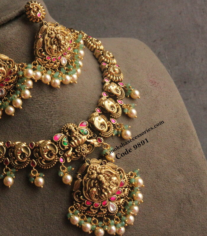 Nakshi lakshmi devi and elephant neckset with pearl and emerald drops