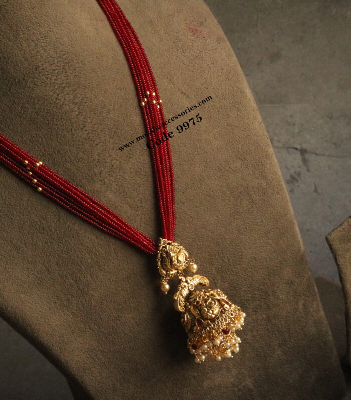 Nakshi jhumki pendant with marroon beads and gold balls