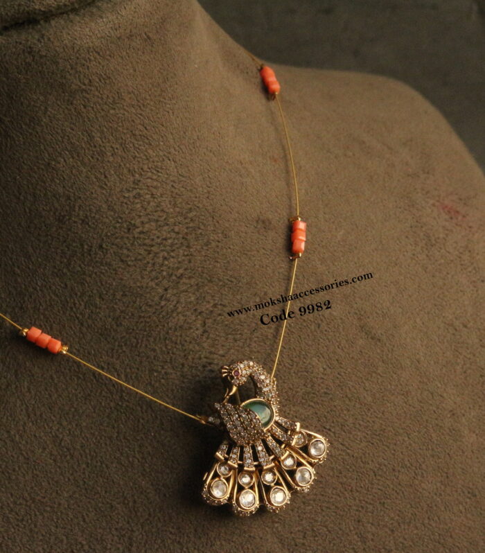 Peacock mozonite stone pendant with invisible chain and coral square beads