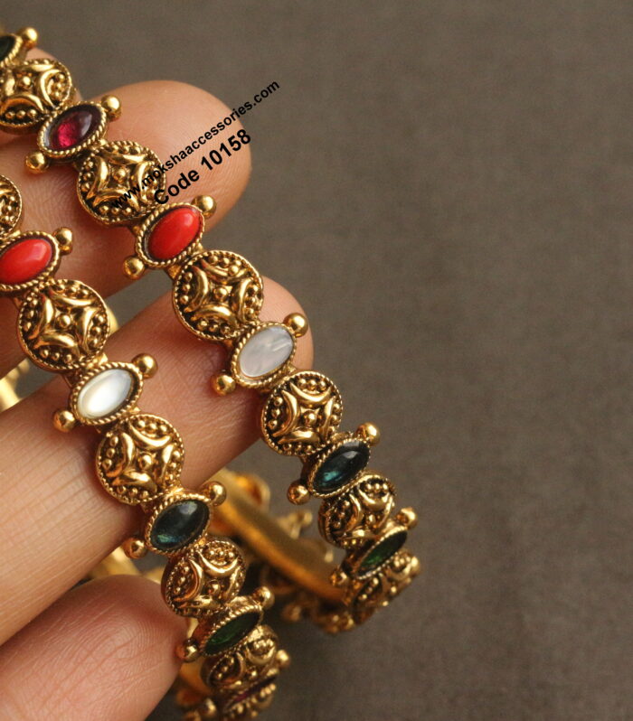 Navrathan nakshi bangles set of 2 (Available in 2.8 -2 , 2.6-2 sizes)
