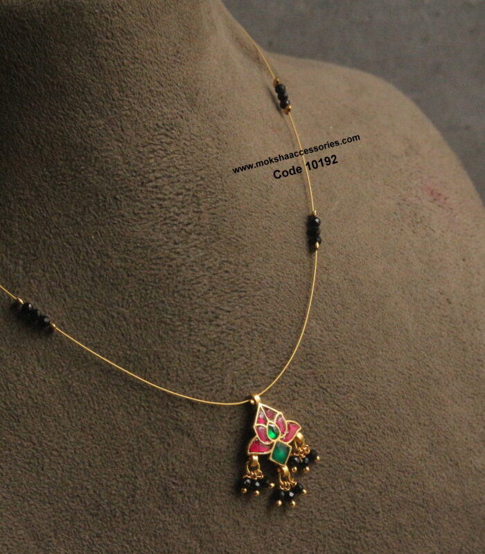 Jadaukundan pendant with black beads and invisible chain