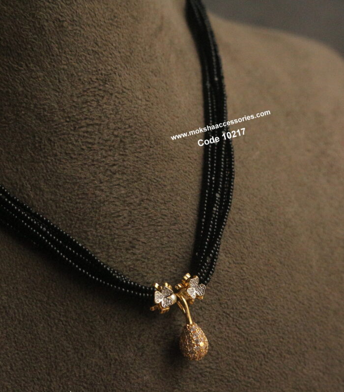 CZ and GJ pendants with black beads