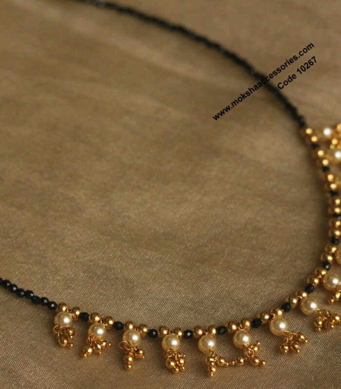 Black beads with premium gold balls and sarvoski pearls