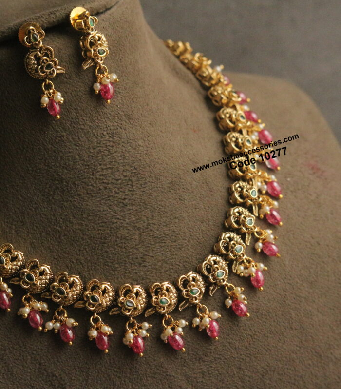 Nakshi emerald stone neckset with cz real drops